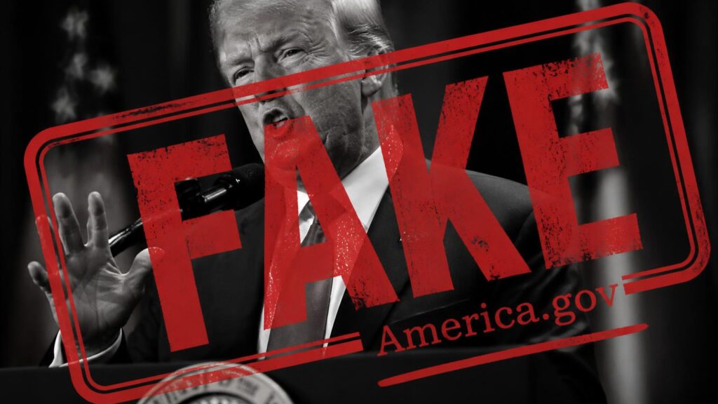 Retrato en blanco y negro de un hombre con traje y micrófono, sobreimpreso por un sello rojo diagonal con la palabra 'FAKE' y la inscripción 'America.gov'.